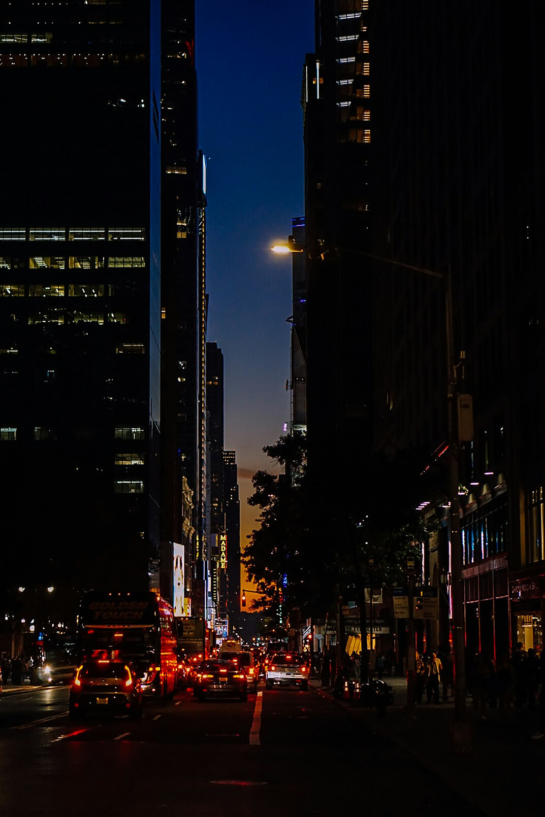 City street with buildings at evening