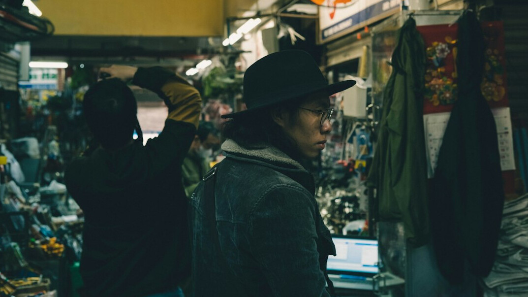 store detective watching thief