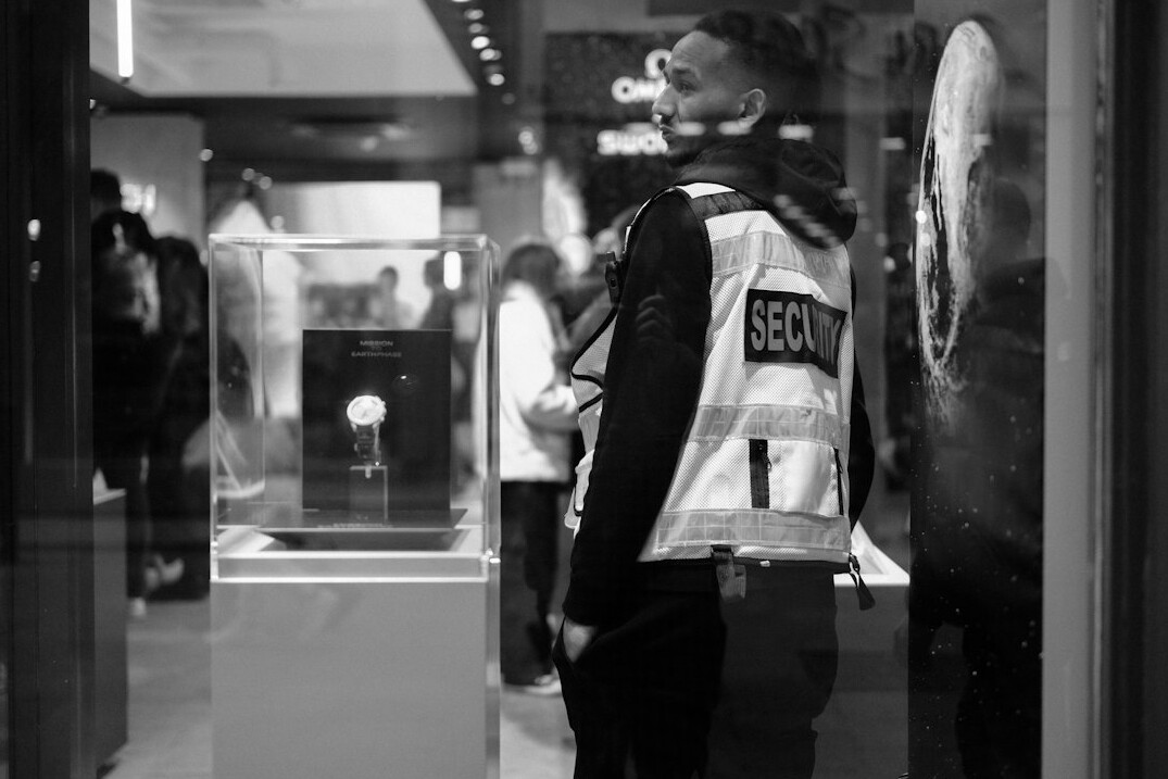 store security guard watching monitors