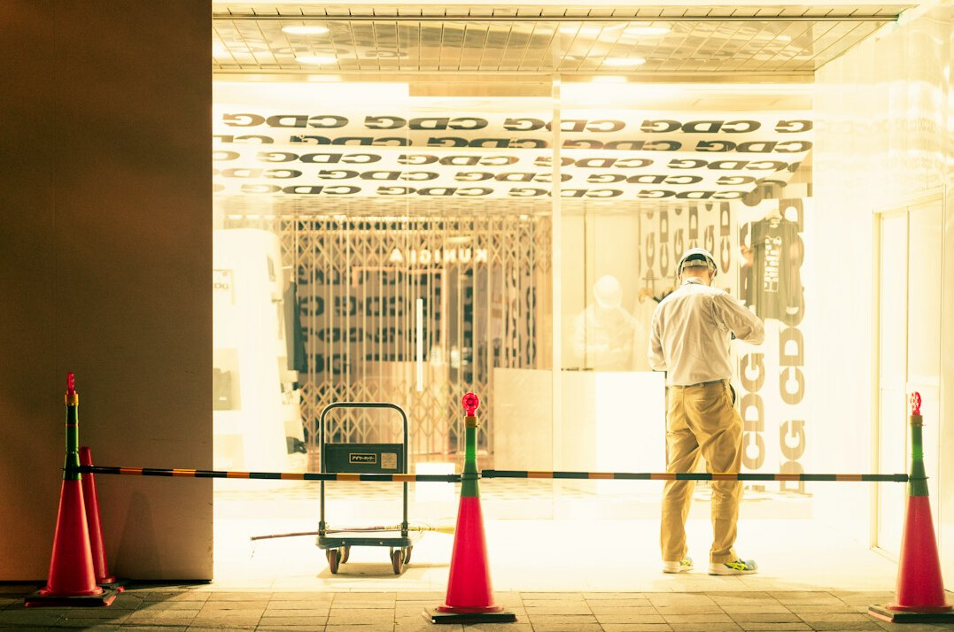 store detective watching customers